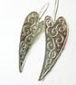 Silver heart dangle earrings.Curved hearts with raised pattern - Image 1