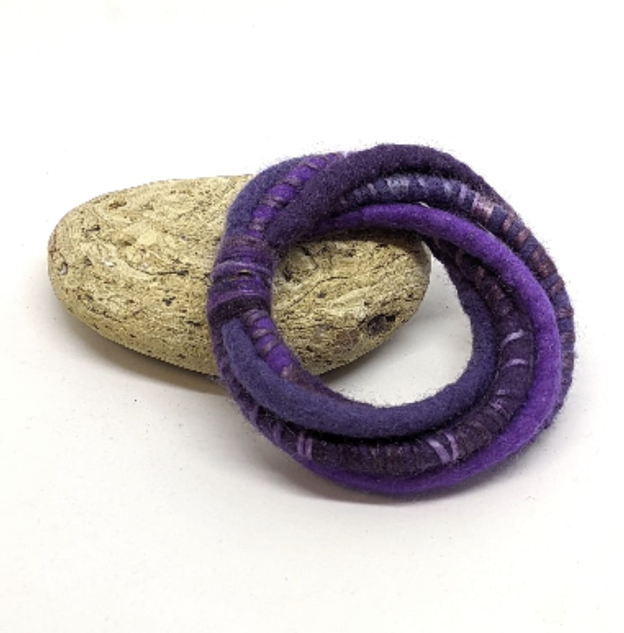 Felted cord bracelet in royal purple, mauve and aubergine shades