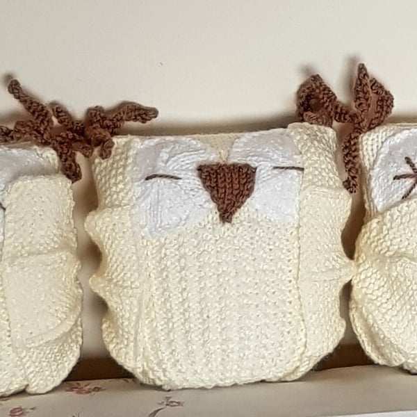 Owls, hand-knitted nursery decorations