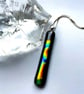 A slice of rainbow fused glass pendant