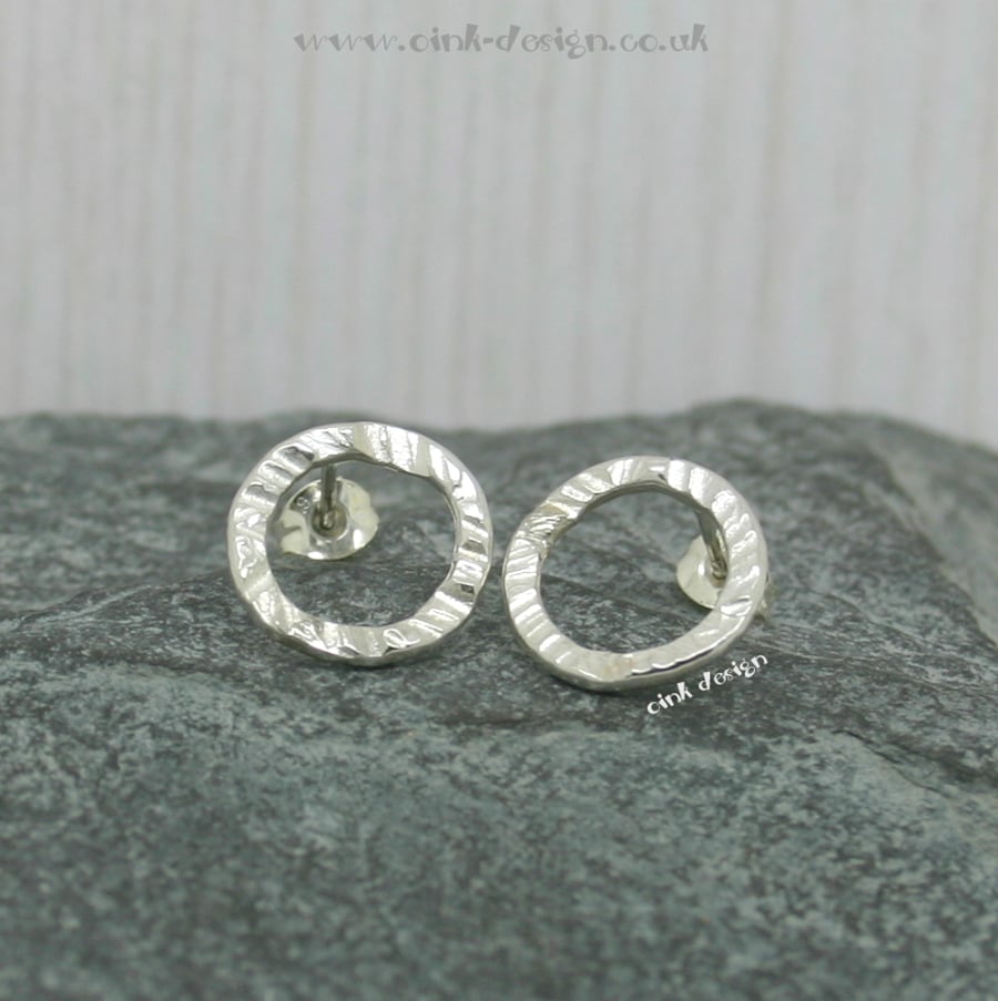 Sterling silver textured circular stud earrings