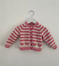 Baby’s pink and cream striped cardigan with heart motifs - Image 8