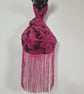 Fuchsia hot Pink raised Velvet leaf pattern Japanese knot bag with tassel trim 