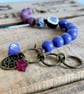 Bohemian Style Bracelet with Artisan Ceramic Heart Charm & Purple Glass Beads - Image 3