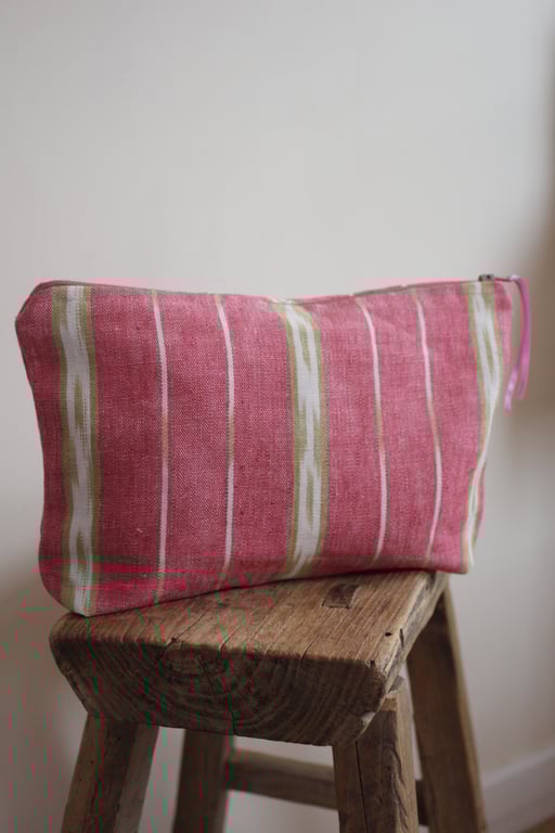 Raspberry and green striped zip up pouch