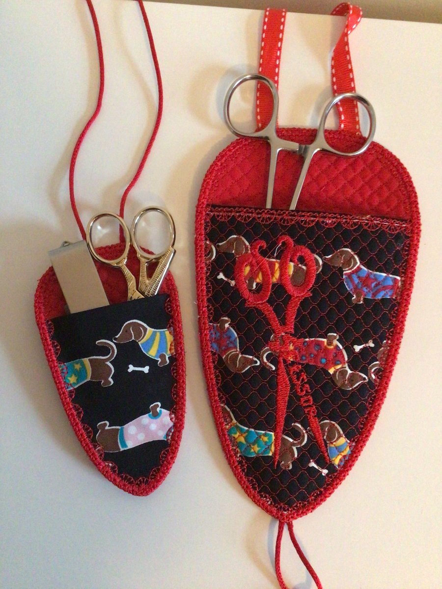 Scissors holder, set of two, red dachshunds.