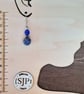Blue and gold polymer clay dangly earrings - Image 4