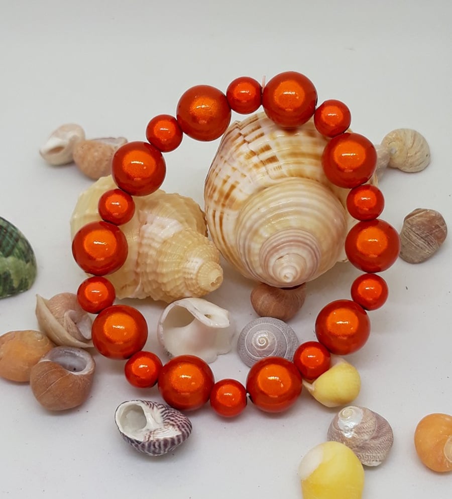 BR314 Orange miracle bead bracelet