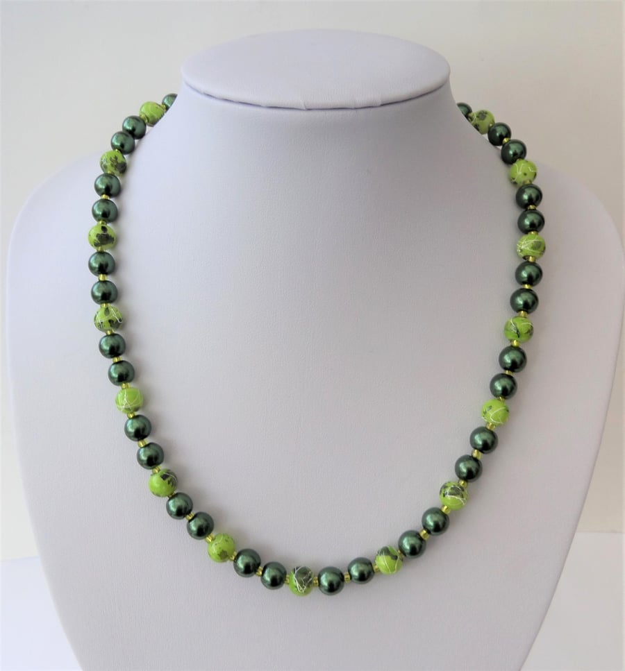 Dark green glass pearl and mid green drawbench bead necklace.