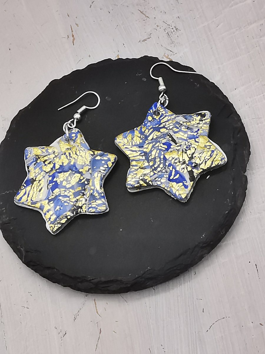 Sparkly star drop earrings. Blue and white tones with gold sparkle