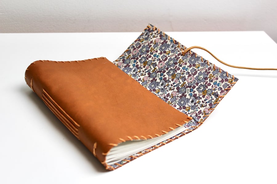 A6 Fold Over Tan Leather handmade notebook floral fabric lining plain paper 