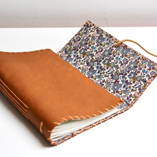 A6 Fold Over Tan Leather handmade notebook floral fabric lining plain paper 
