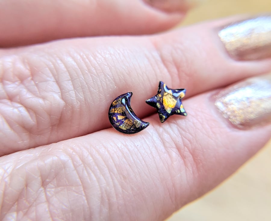 Mismatched purple moon and star celestial stud earrings