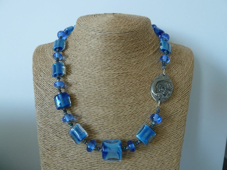 blue lampwork glass necklace, pewter mermaid