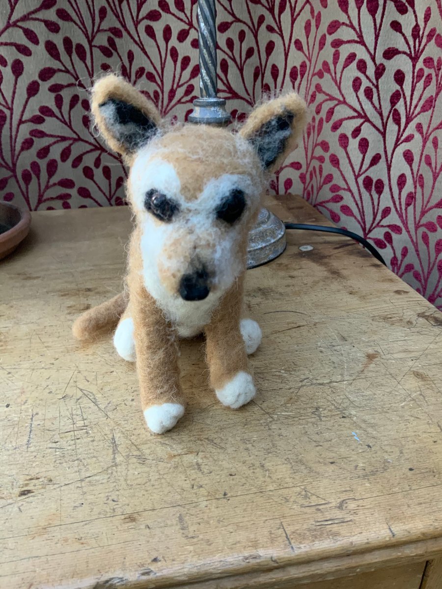 Needle felt dog. A really cute brown dog.  6.5” high. 9” from nose to tail.