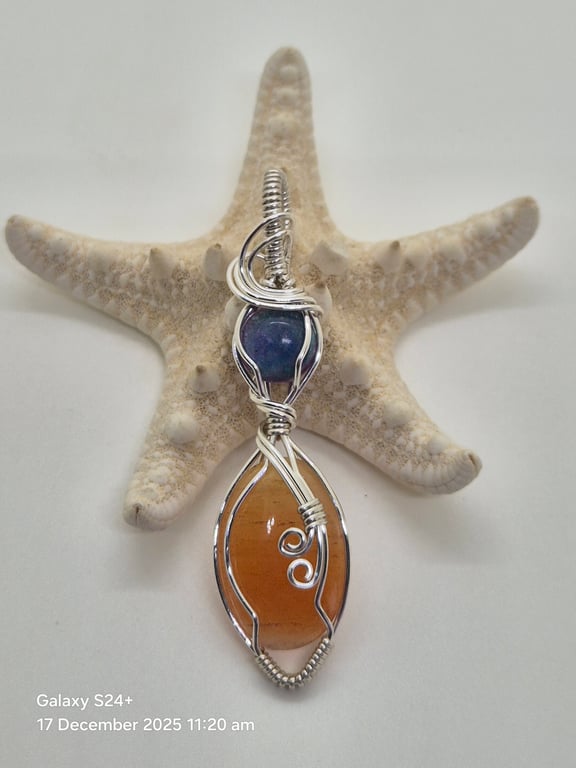 Peach Aventurine wire wrapped pendant in silver with purple resin accent