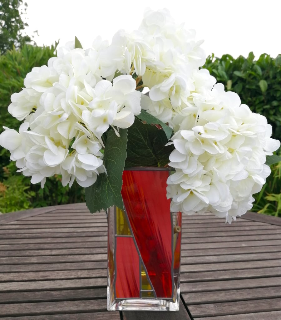 Dervish Flame is a tall, square stained glass effect flower vase