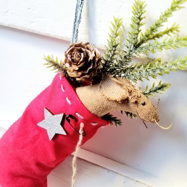 Primitive mouse in a Christmas stocking 