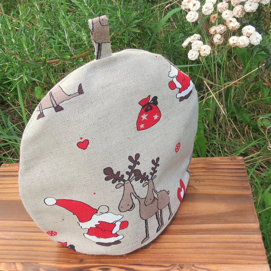 A festive tea cosy.  To fit a 2 - 3 cup teapot.  Christmas.