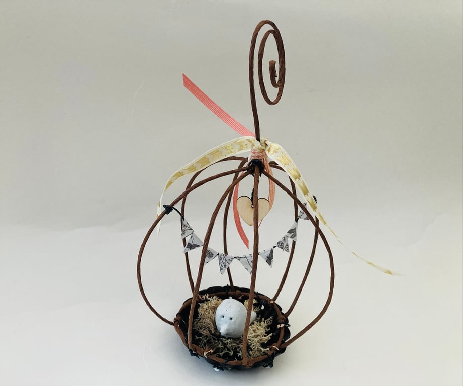 Wire bird cage sculpture