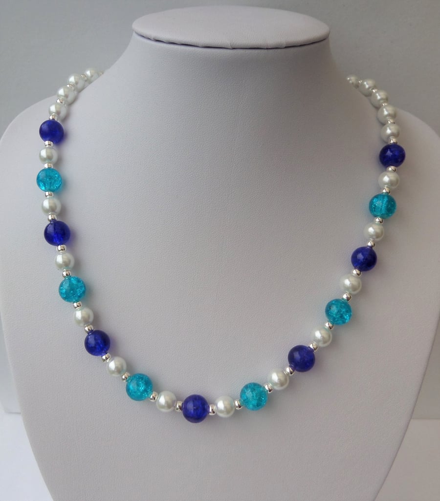 White glass pearl and two colours of blue crackle glass bead necklace.