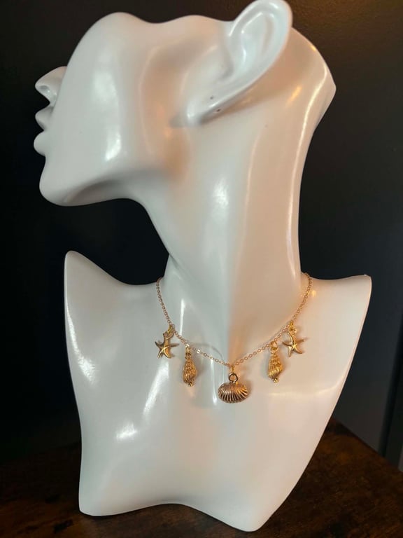 Gold Tone Shell & Starfish Charm Necklace