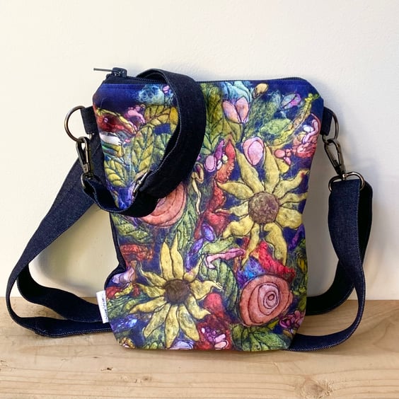 Flower cross body shoulder bag with long strap. 