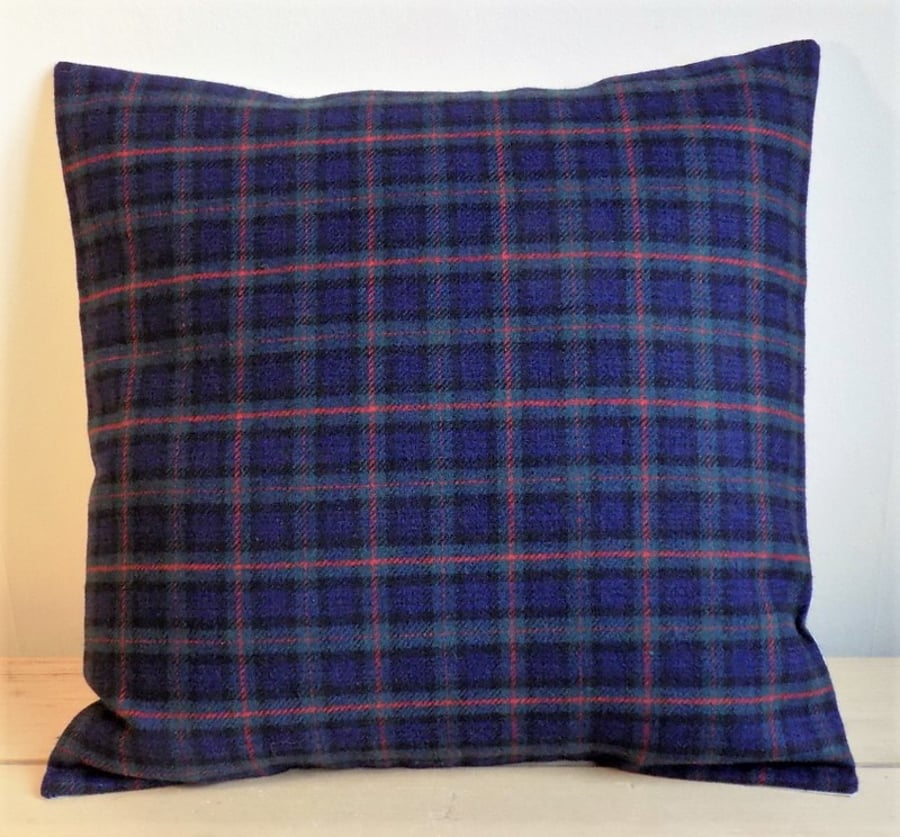 Cushion cover. Tartan plaid in dark blue, turquoise, black and red