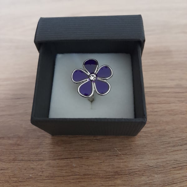 PURPLE AND SILVER FLOWER ADJUSTABLE RING.