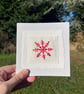Red snowflake, hand embroidered 'Scandi' Christmas card, recycled card