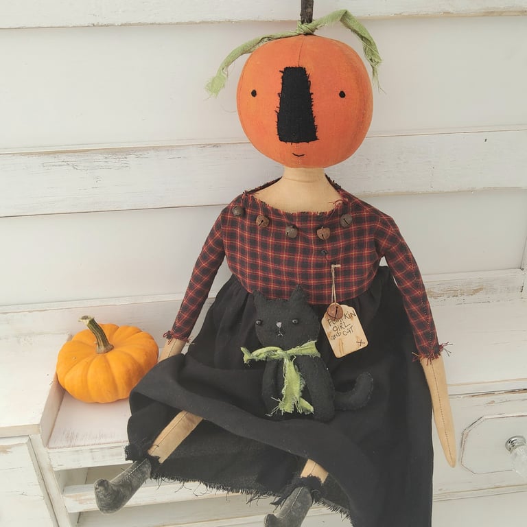 Primitive pumpkin girl doll with cat
