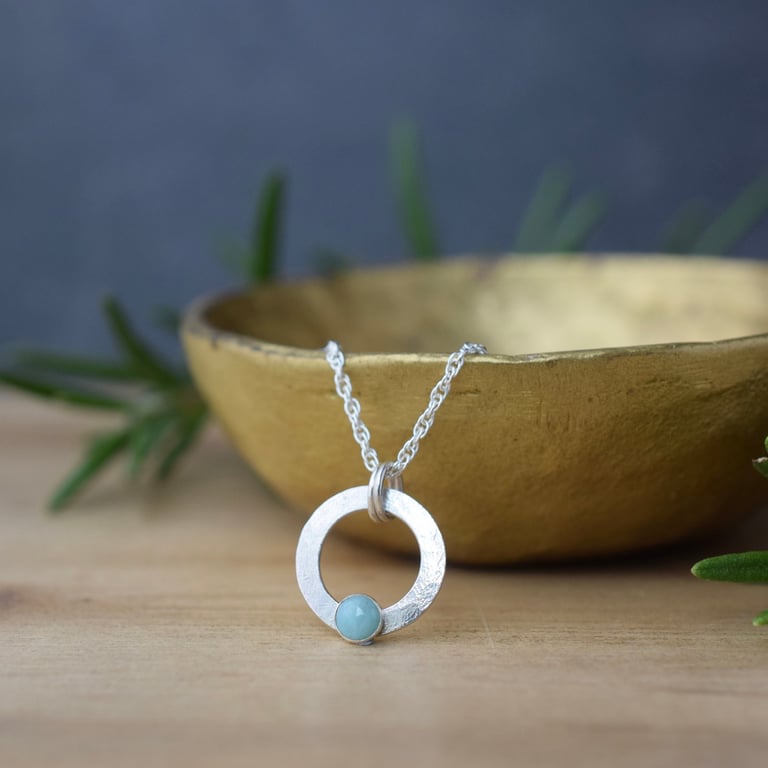Sterling silver circle pendant with larimar gemstone