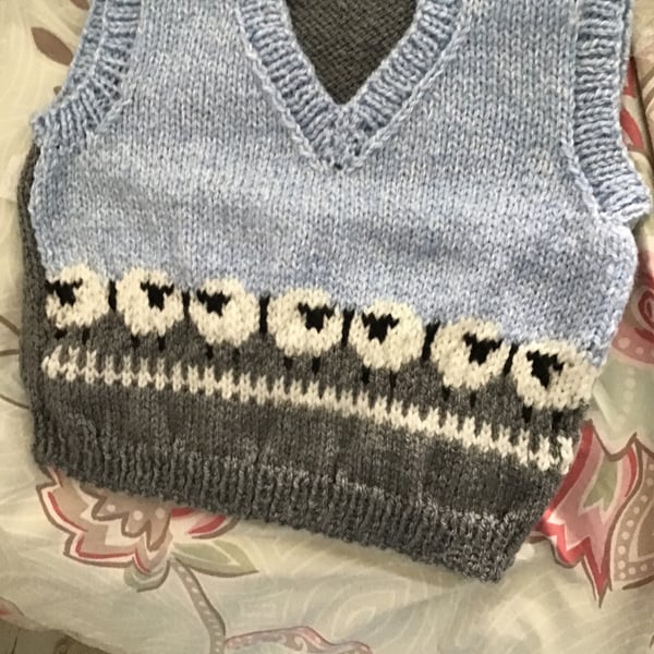 Handknitted fairisle tanktop with sheep for 6 months