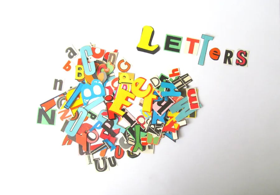Vintage paper letters:150 hand cut from vintage texts. Die cut letters for craft