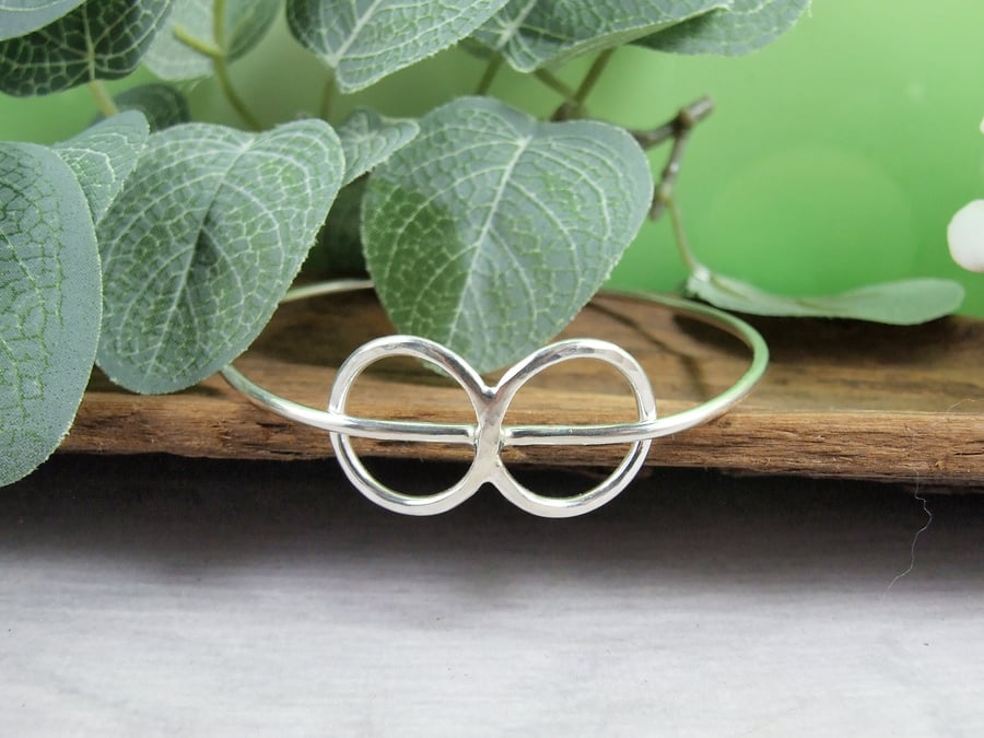 Sterling Silver Infinty Knot Bangle. Fits Size Medium 20cm 