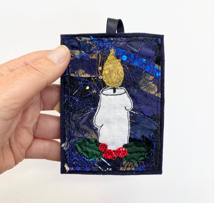 Upcycled embroidered candle with holly home Christmas decoration. 