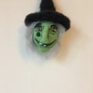 Green witches head Bauble