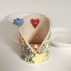 Spring flowers and bird ceramic candle holder