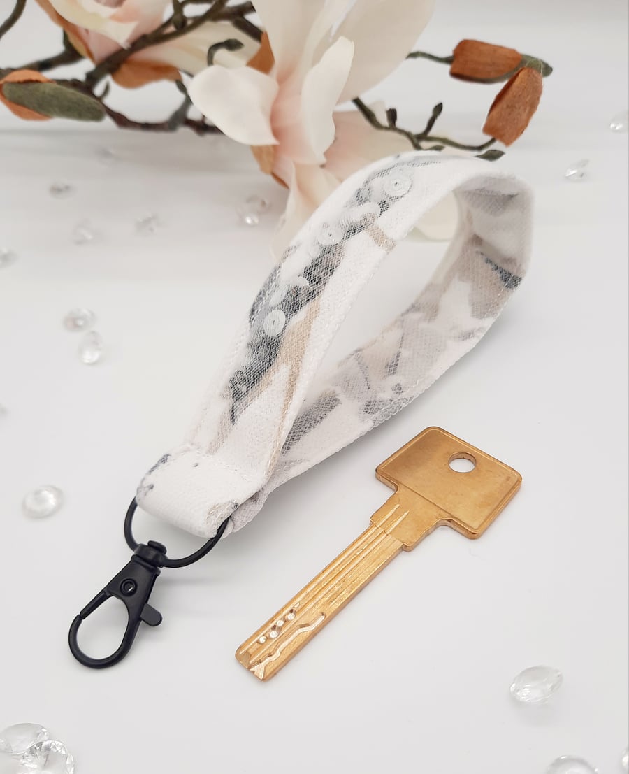 Wristlet keyring filled with beads and sequins,  white tulle keyring. 