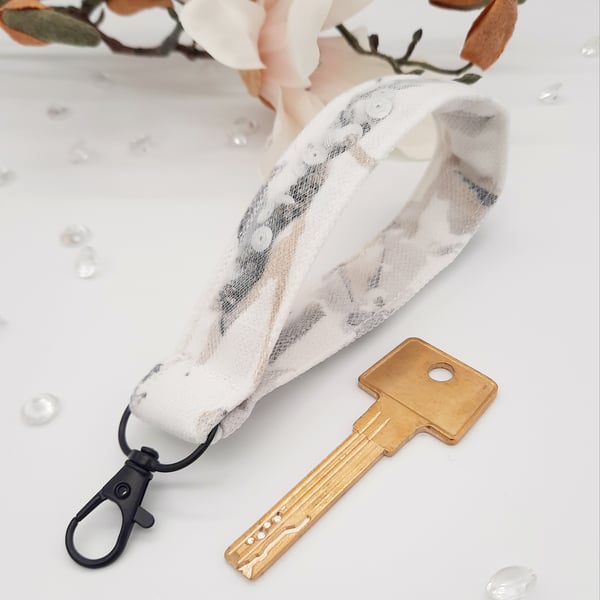 Wristlet keyring filled with beads and sequins,  white tulle keyring. 