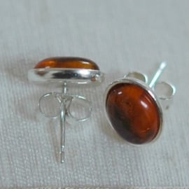Sterling silver and amber oval stud earrings. November birthstone.