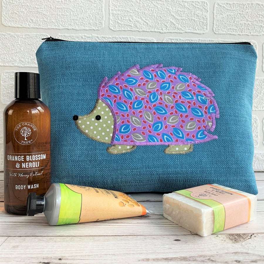 Hedgehog toiletry bag, wash bag in turquoise with purple hedgehog