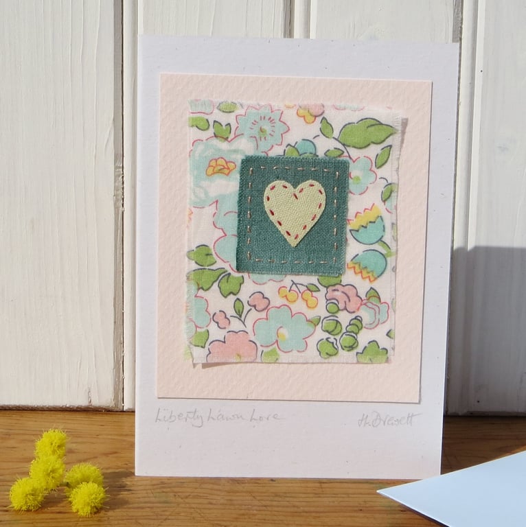 Hand-stitched heart card with cheerful Liberty tana lawn cotton background