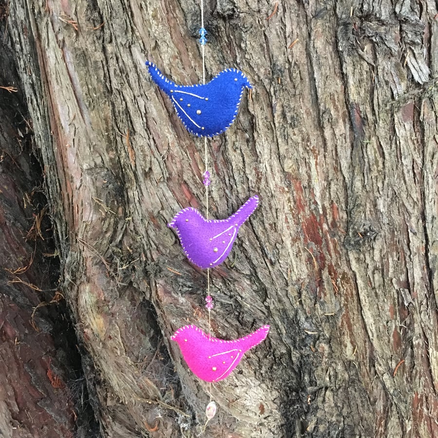 Multicoloured felt bird hanging decoration