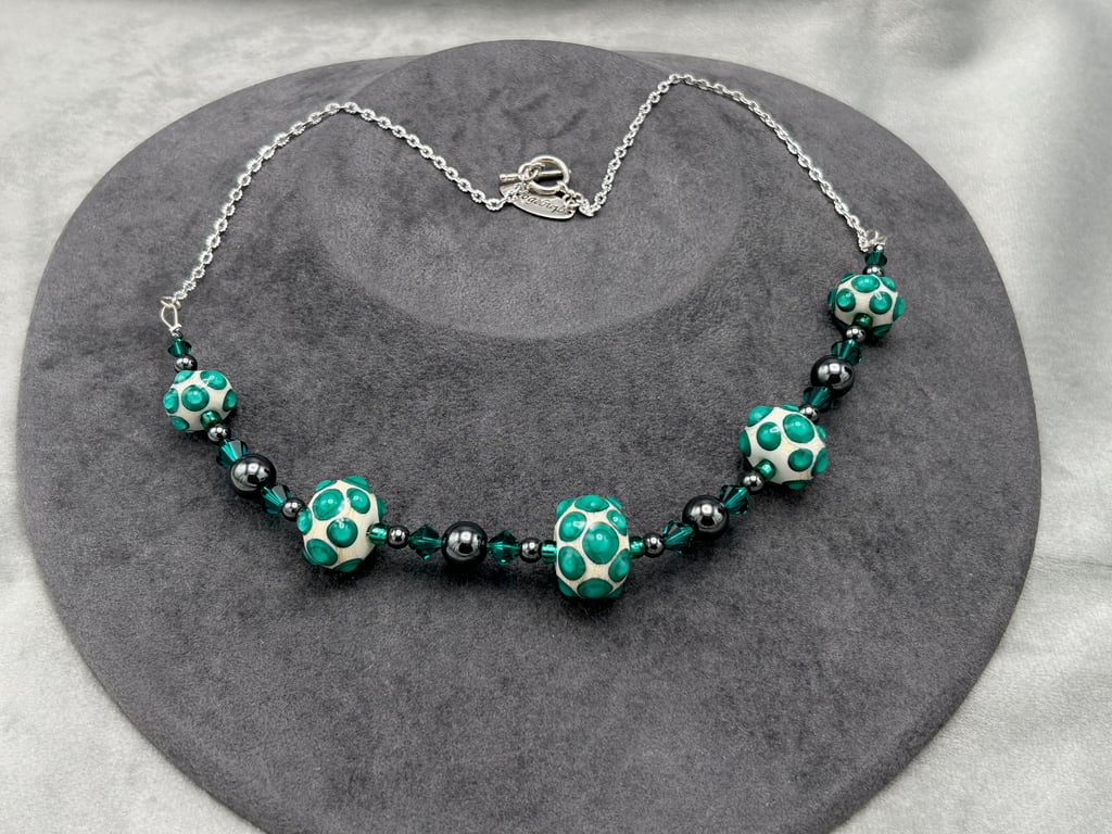 Cream and emerald green lampwork glass Swarovski Crystal and haematite necklace
