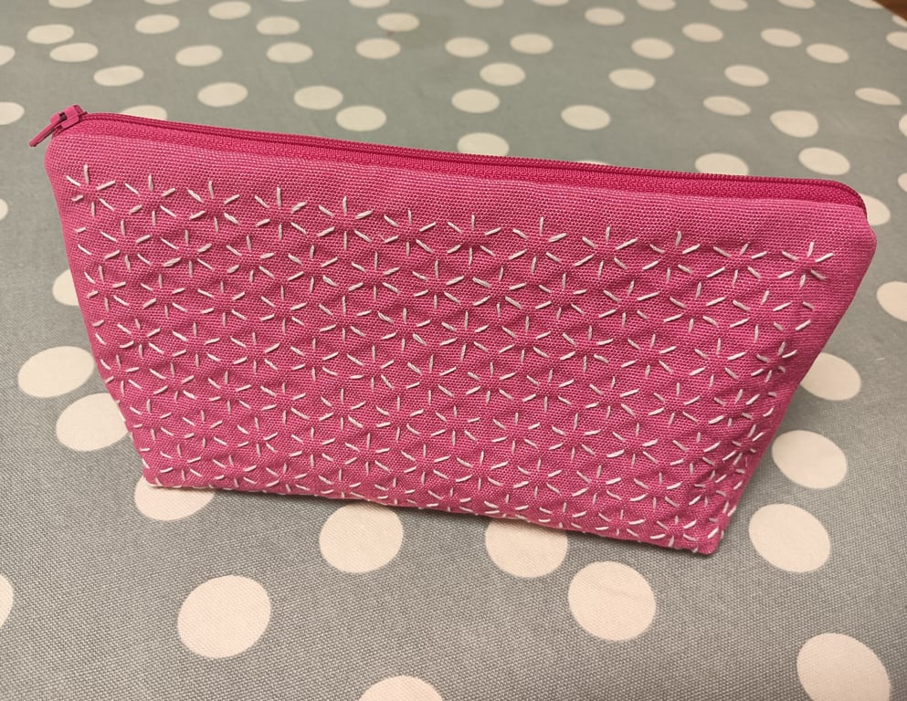 Pink makeup bag with sashiko embroidery detail 