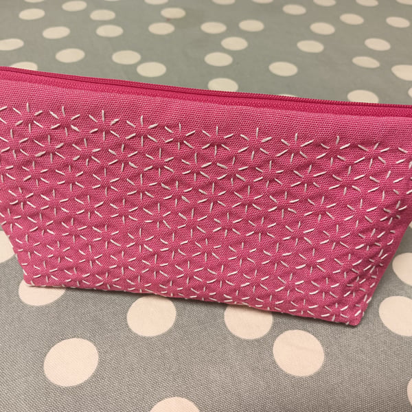 Pink makeup bag with sashiko embroidery detail 