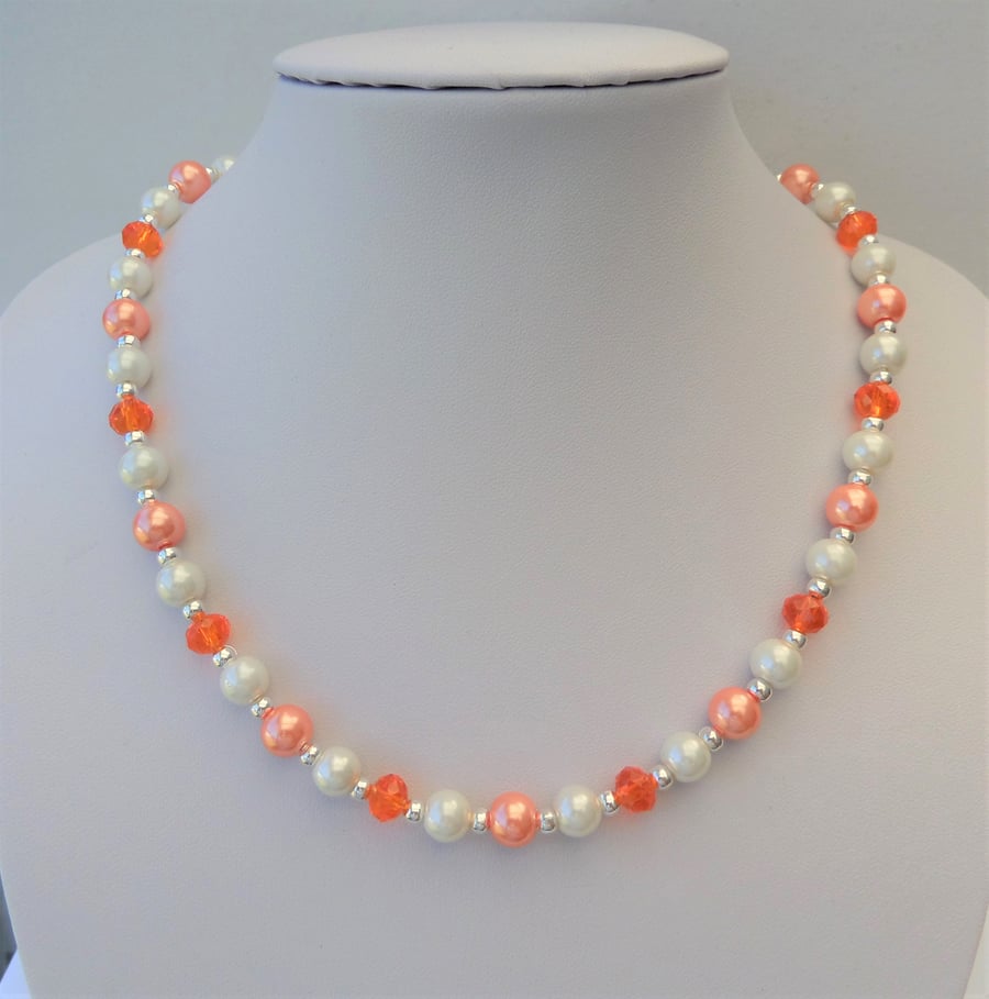Orange rondelle, peach and cream-ivory glass pearl bead necklace.