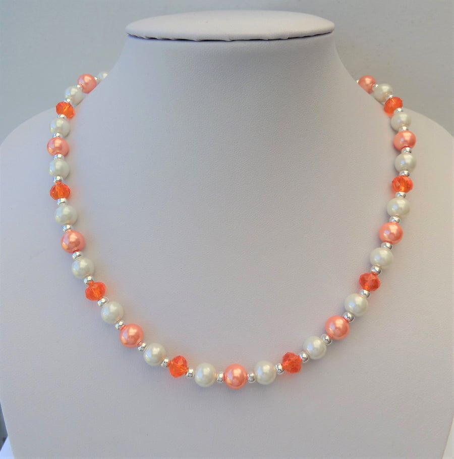 Orange rondelle, peach and cream-ivory glass pearl bead necklace.