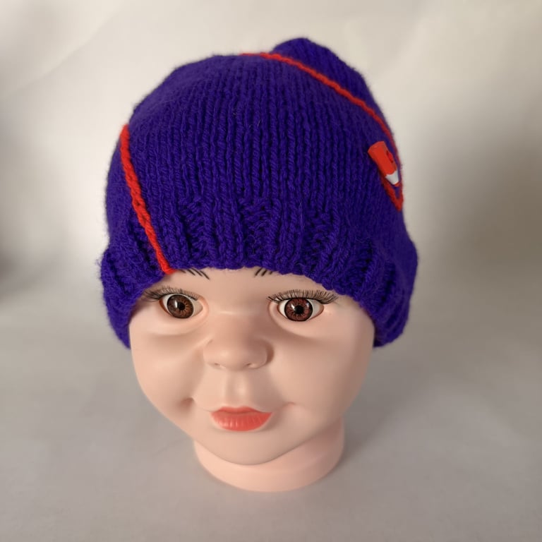 Children's hand knitted pencil and scribble hat